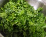 A picture of step 4 of Kerala style palak thoran.
