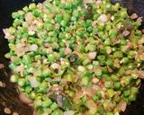A picture of step 4 of Beans Poriyal stir fry.
