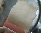 A picture of step 2 of (Snack) Fried Sandwich-Wrapped Sausages.