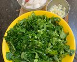 A picture of step 1 of Muli ka saag stir fried with besan (Radish greens with Gram flour).
