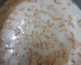 A picture of step 1 of Oats, Banana and Coconut Smoothie vegan.