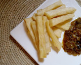 A picture of step 2 of Yam fingers with onion source.