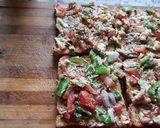 A picture of step 6 of Garlic Brown Bread mix vegetables cheese mini bread pizza.