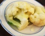 A picture of step 4 of Cauliflower white Korma Malabar masala curry.
