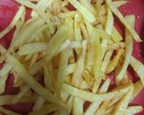 A picture of step 2 of French fries pizza.