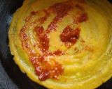 A picture of step 4 of Schezwan Dosa Wrap.
