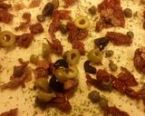 A picture of step 6 of Focaccia with Tumminia Flour, Sun-Dried Tomatoes, Capers, and Olives.