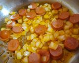 Foto del paso 3 de la receta: Arroz con pollo y salchichas a mi manera