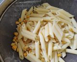 A picture of step 3 of Penne pasta with cheese.