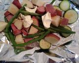 A picture of step 2 of Garlic butter foil dinner bake.