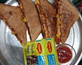 A picture of step 7 of Corn cheese pizza sandwich.