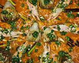 Foto del paso 8 de la receta: Arroz Maty, con alcachofas confitadas, ajos tiernos, gambas langostineras y sepia