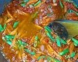 A picture of step 1 of Jollof macaroni.