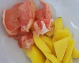 A picture of step 1 of My Grapefruit & Mango Juice. 🤗.