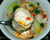 A picture of step 7 of Spicy and Creamy Tom Kha Gai (Thai Chicken Coconut Soup).