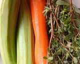 A picture of step 1 of Cucumber, Carrot, and Purslane Salad.