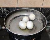 A picture of step 1 of Egg peas masala.