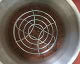 A picture of step 8 of Atta jaggery depression cake with dates.