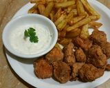 A picture of step 5 of Chilli n spice chicken with french fries n mayo garlic sauce😋.