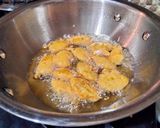 A picture of step 4 of Lotus stem pakore in Italian seasoning.