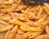 A picture of step 5 of Penne ai funghi (Penne in Mushroom Sauce).