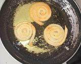 A picture of step 5 of Jalebi with rabdi milk.