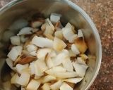A picture of step 1 of Coconut Lobongo Lotika.
