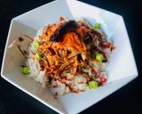 A picture of step 3 of Pulled Pork with Lemon+Chilli Pepper+Red Onions Rice.Garnish-Salty Grated Carrots+Scallions.