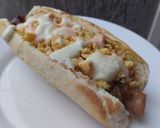 Foto del paso 9 de la receta: Perritos🧀calientes🍍a mi estilo🥯🌭