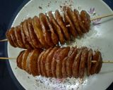 A picture of step 8 of Tornado Potatoes.