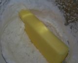 A picture of step 3 of Eggless cooker cake.