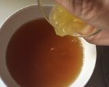 A picture of step 4 of Orange ice tea.