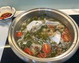 Hình bước làm 7 của món Canh Chua Đầu Cá Hú Nấu Lá Giang