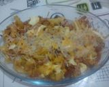 Foto del paso 1 de la receta Patatas con beicon, jamón york, salchichas y huevos rotos con queso y gratinado