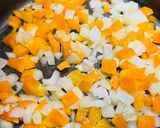 A picture of step 2 of Meatless Enchilada Pie.