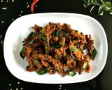 A picture of step 5 of Bhindi Kurkuri.