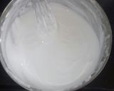 A picture of step 2 of Lemon cake pudding with upside down kiwi whipped cream frosting.
