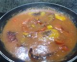 A picture of step 4 of Peppers in a tomato sauce.