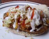 Foto del paso 6 de la receta: Pan🥐 turco relleno con milanesas de berenjena🍆 y calabacín🌮