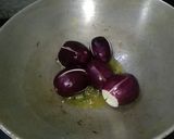 A picture of step 1 of Baigan Tomato Curry.