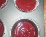 A picture of step 4 of Red Velvet çhoçolate inside Cupcakes with cream cheese frosting.