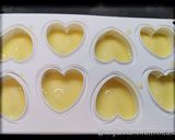 A picture of step 2 of White Chocolate Panna Cotta with Orange Gelée.
