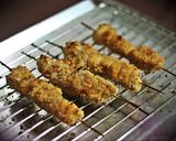A picture of step 7 of Crispy grilled fish skewers.
