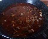 Foto del paso 7 de la receta: Conejo con rebollones (níscalos) y caracoles