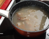 Foto del paso 1 de la receta: Cazuela de arroz integral con voladores y langostinos