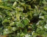 A picture of step 3 of Palak Aloo with Chapati.
