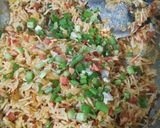 A picture of step 7 of Smoky schezwan Fried Rice.