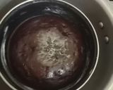 A picture of step 6 of Bourbon and oreo biscuit cake.