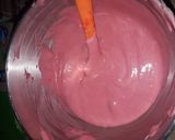 A picture of step 5 of Strawberry milk cake with whipped cream frosting.