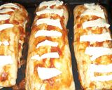 Foto del paso 3 de la receta: Enrollado a la pizza relleno con jamón, queso y tomate